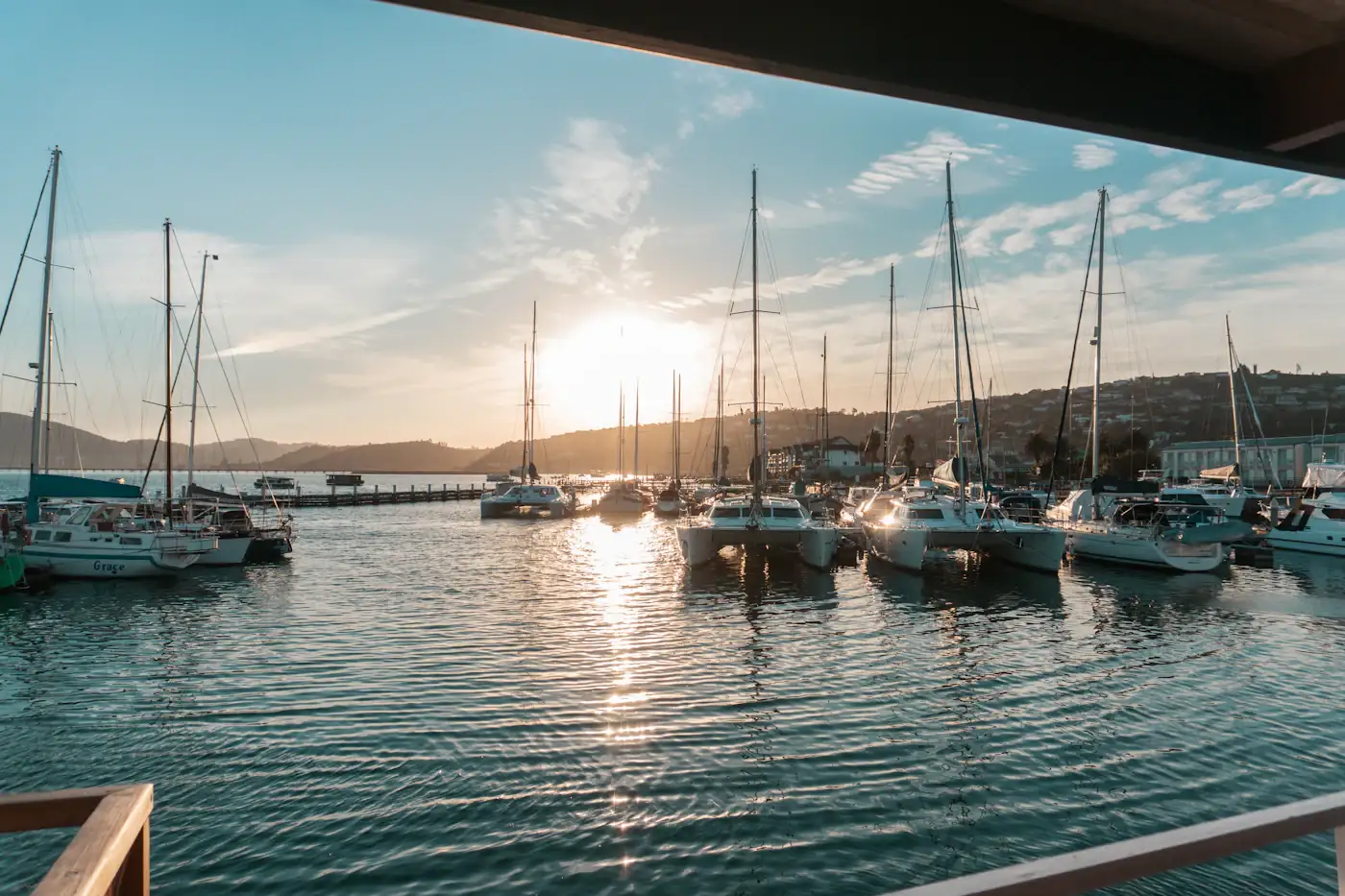 Sunset over yachts moored at the Knysna Yacht Club