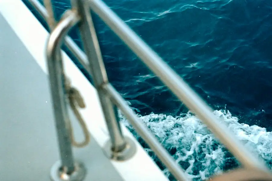 Polished stainless steel guard rail on a boat at sea